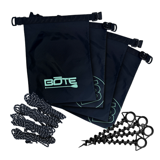 Front view of Anchor Kit with three BOTE logo bags, ropes, and black screw anchors.