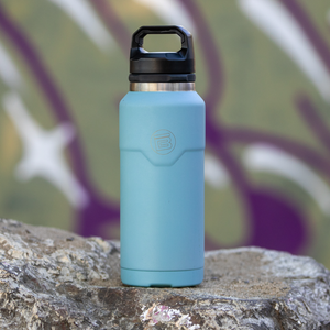 Front view of the MAGNEBottle 36oz with Cap in Steel Blue, highlighting its black handle cap.